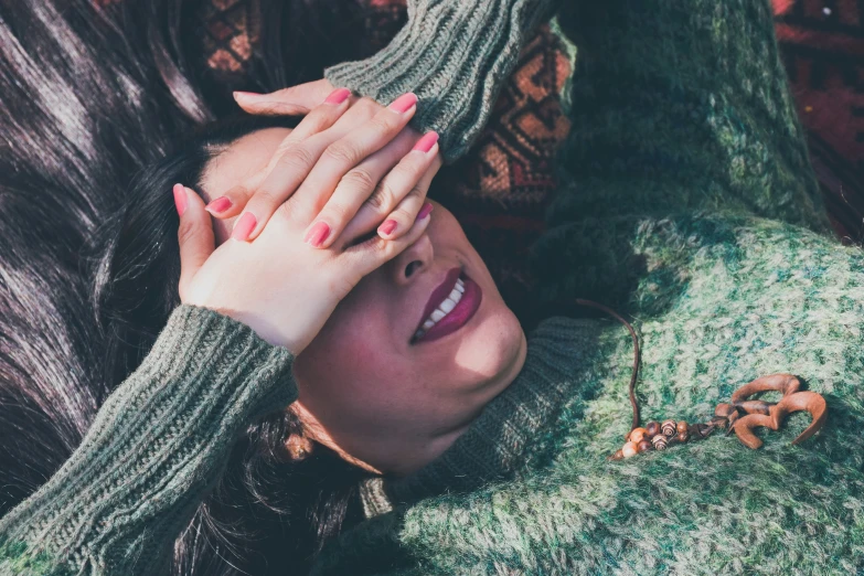 an image of woman wearing scarf posing for po