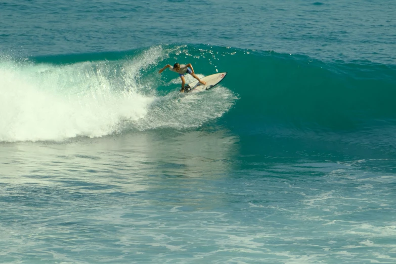 a surfer is riding the wave in the ocean