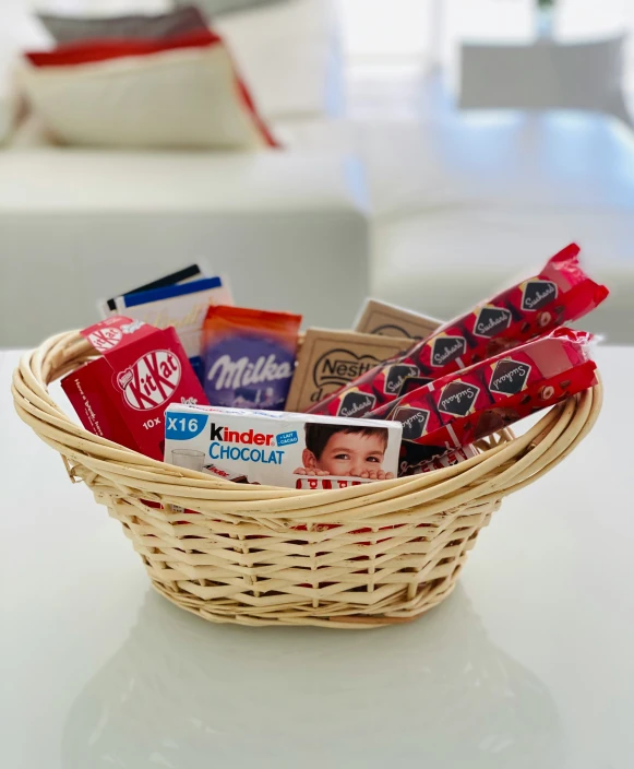 a basket filled with lots of food and candy