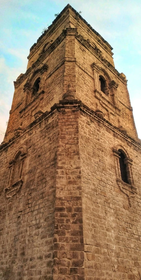 the tower on top of a building is not made of stone