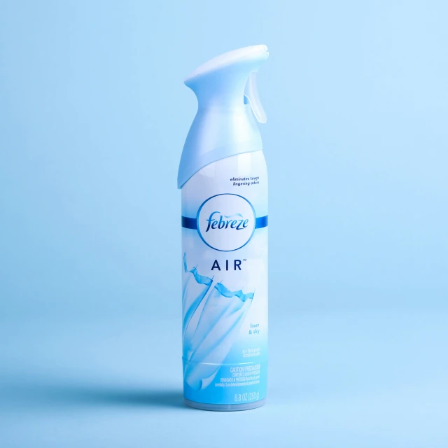 a clear bottle of air fresh on blue background