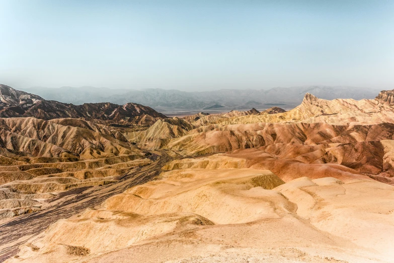 view of mountains in the desert from a plane