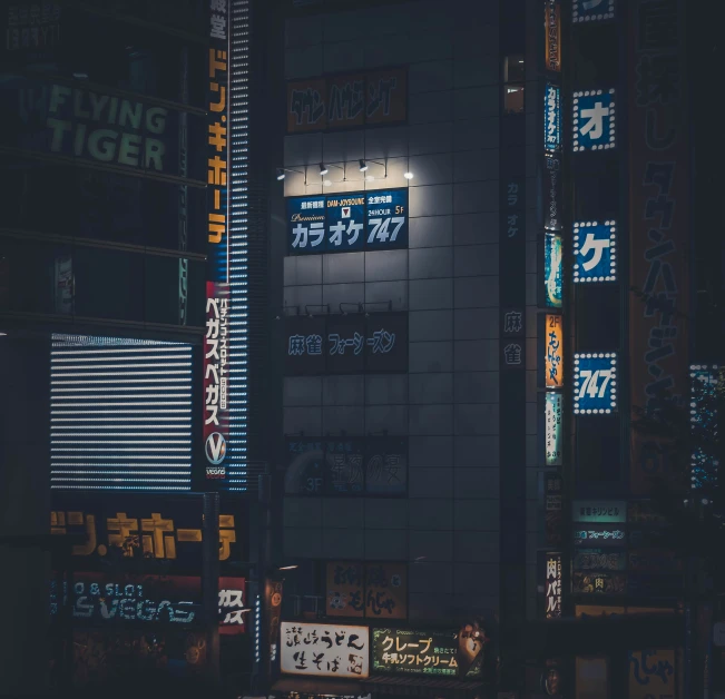 this is an image of some buildings lit up at night