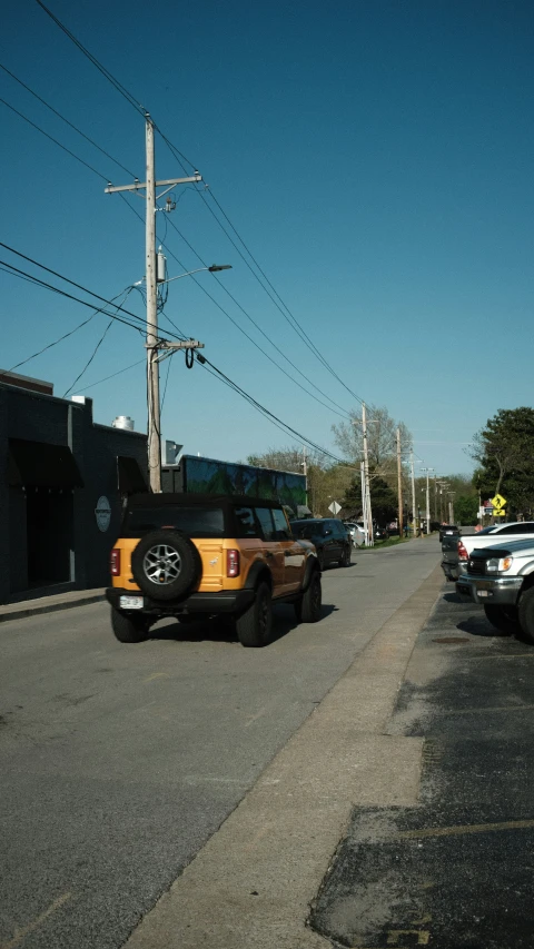 a vehicle that is parked next to a street