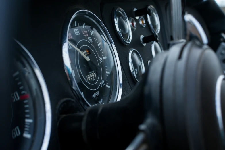 a dashboard showing various instruments of cars