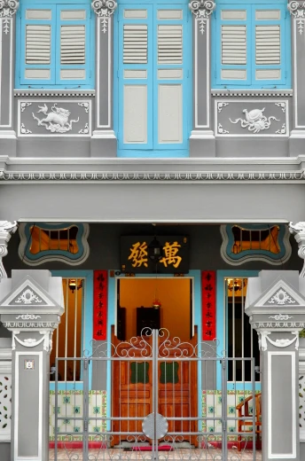 front view of building with chinese writing on the door