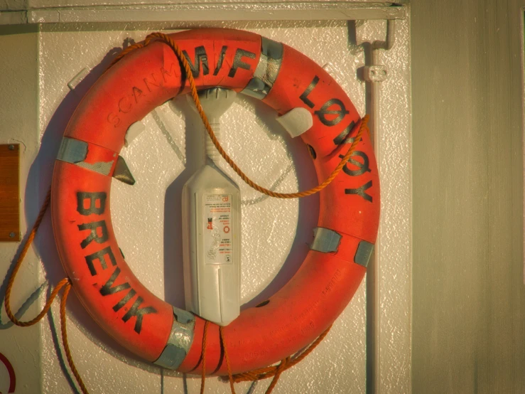 a life preserver attached to a white wall