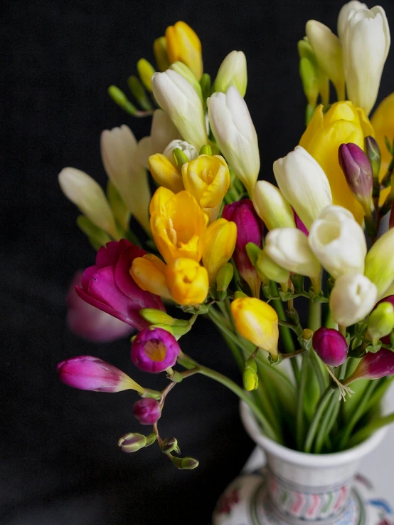 there is a vase with some flowers in it