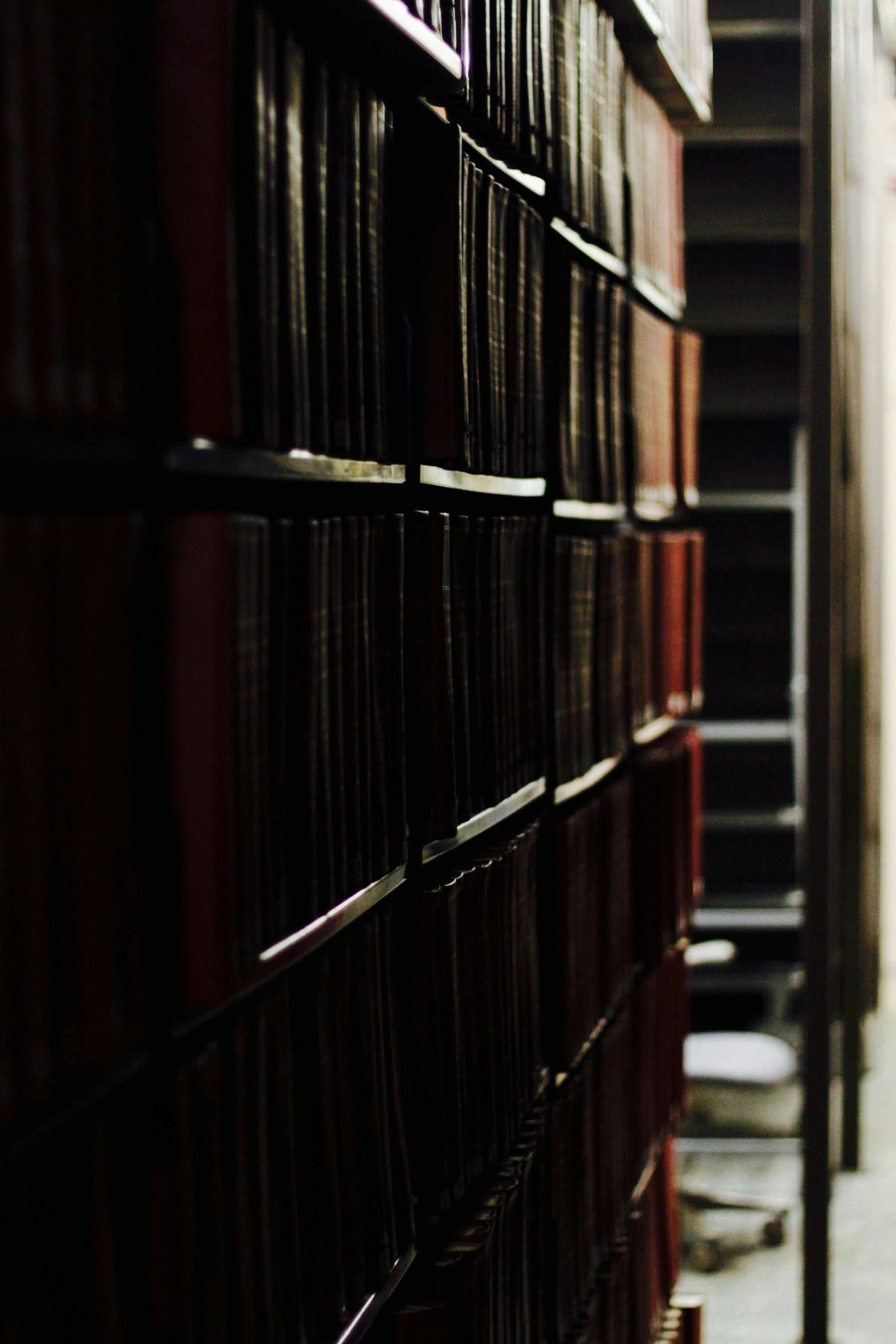 a long building with several stacks of books on it