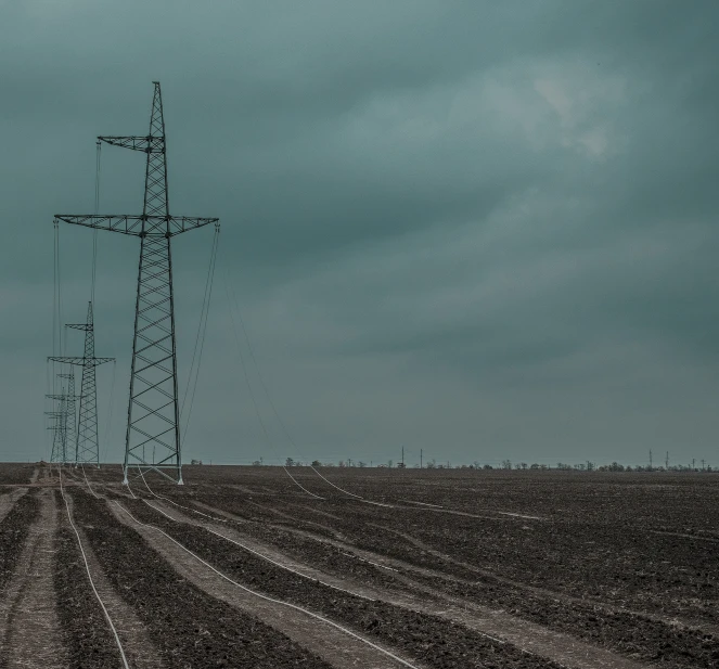 there is a cell phone tower in the middle of the field