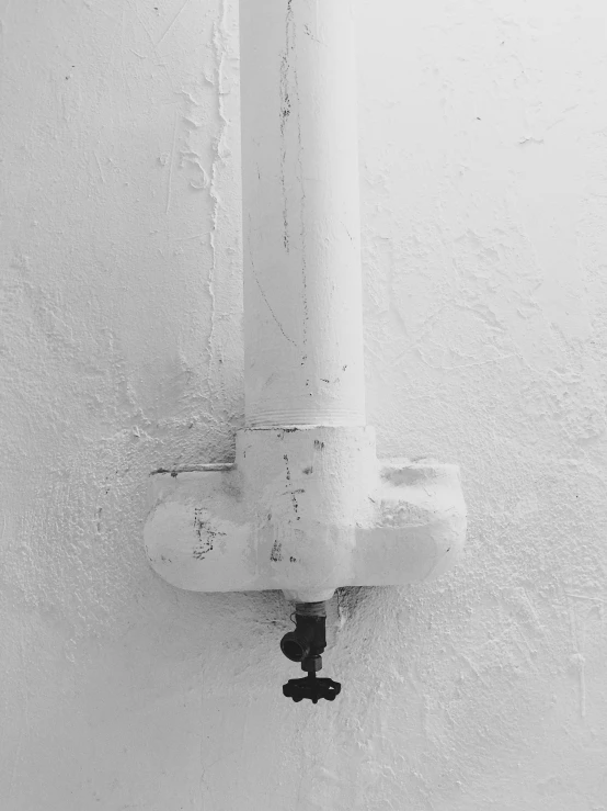 the black and white image shows an exposed fire hydrant