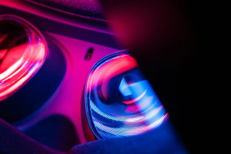 a pair of speakers in front of a dark background