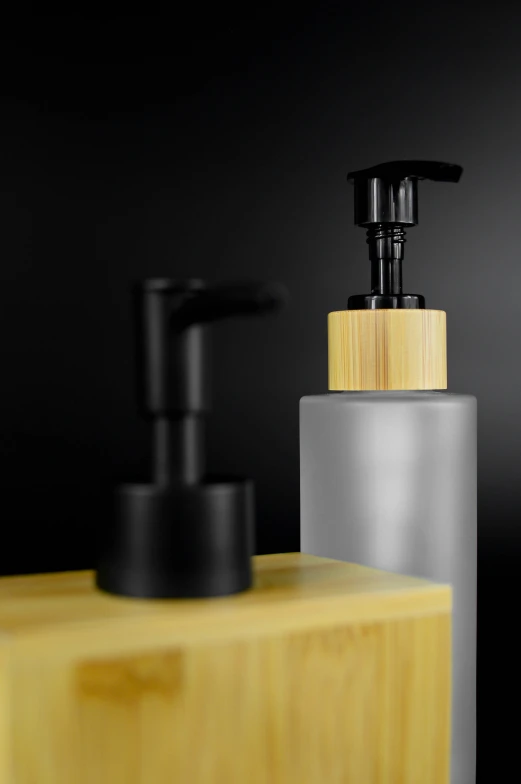 soap dispenser with soap pump on wooden block