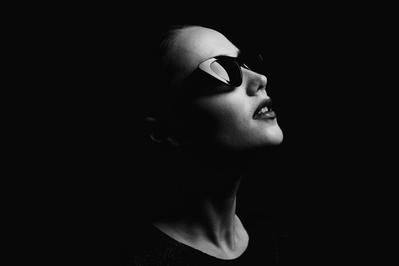 black and white portrait of a woman with sunglasses