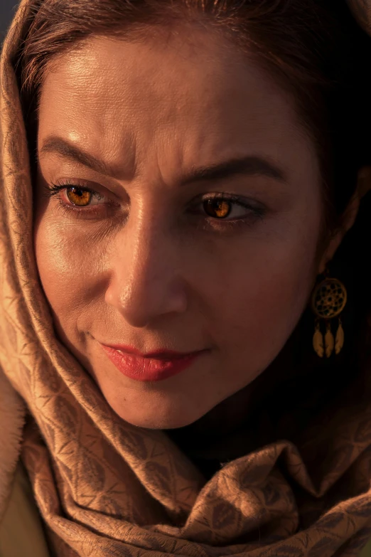 a woman with her eyes yellow painted on