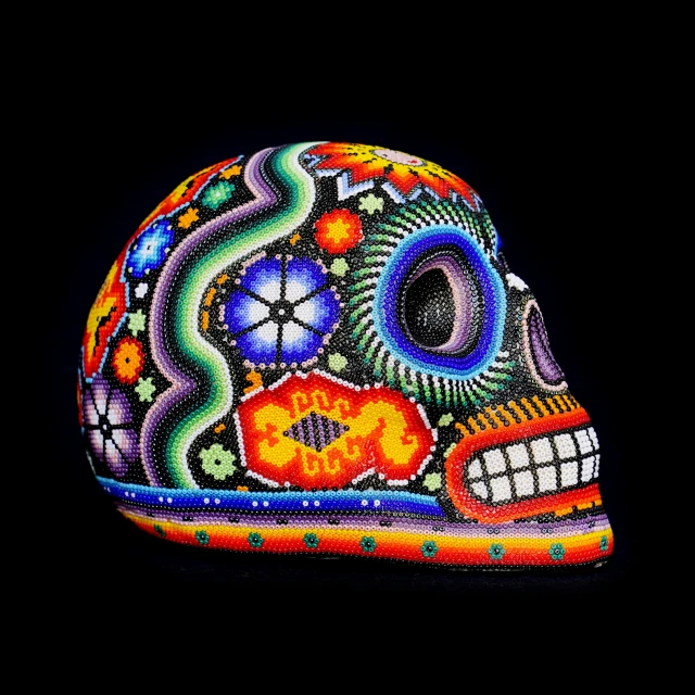 a colorful skull in full color with big teeth