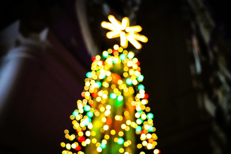 the christmas tree has lights all around it
