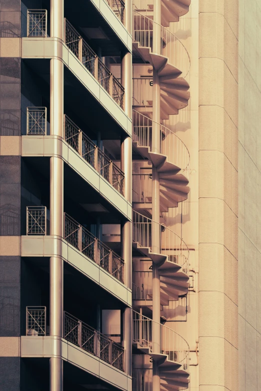 an apartment building has metal balconies and balconies on each balconies