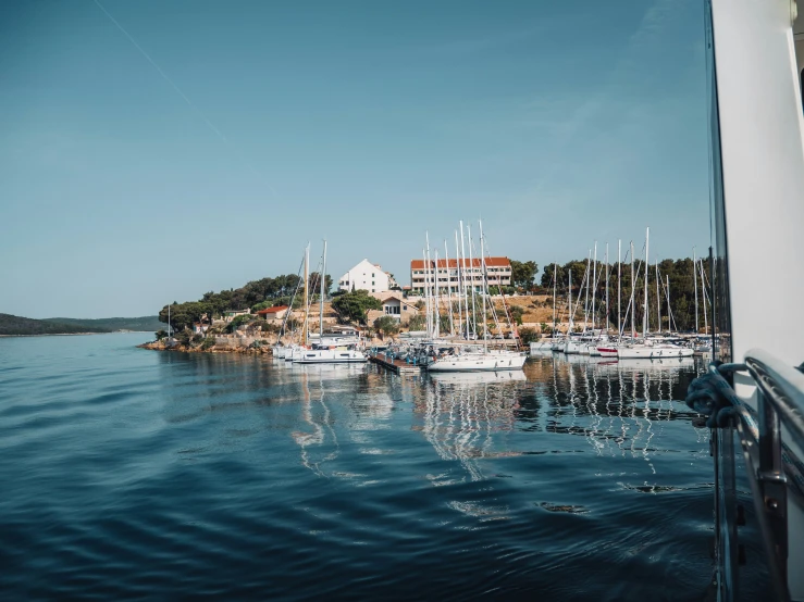 a small island with lots of boats in the water