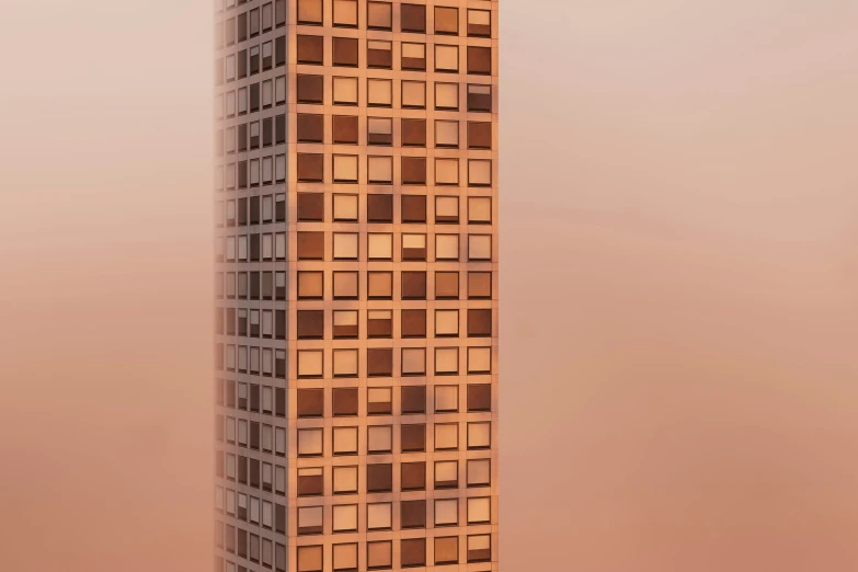 there is a tall building that has many windows on it