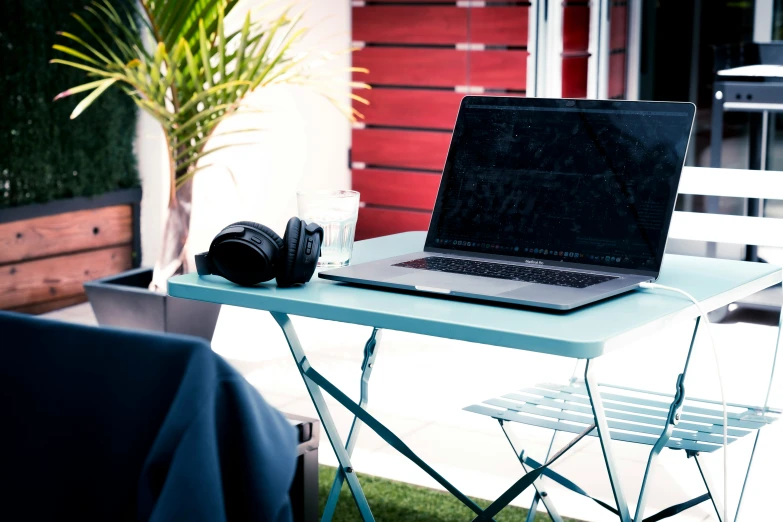 there is an open laptop sitting on a table