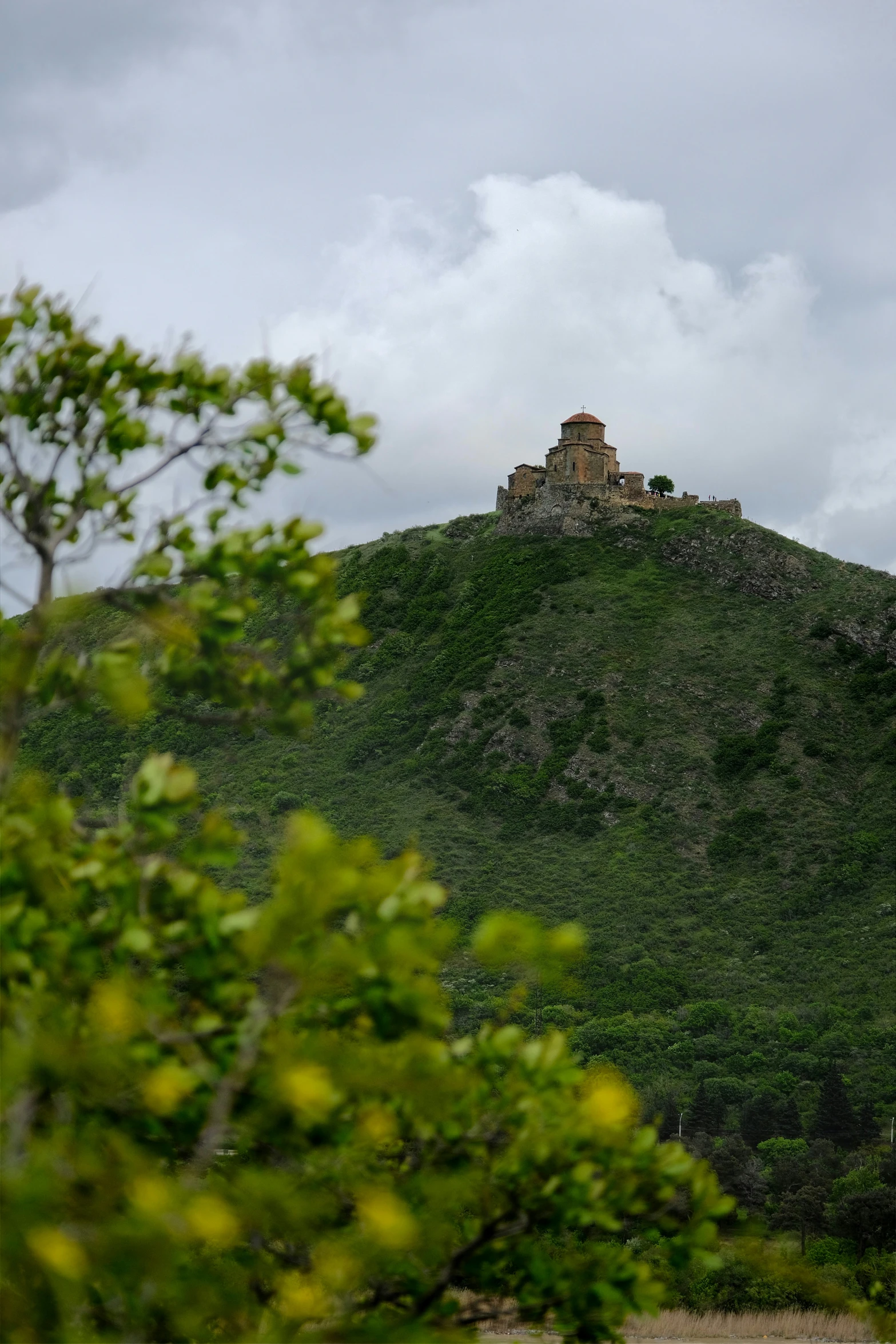 a scenic view of a mountain in the distance