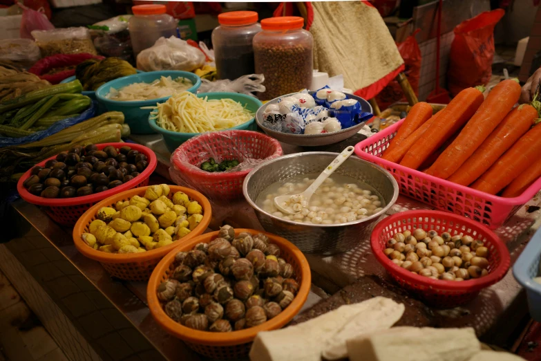 a variety of foods are arranged in baskets