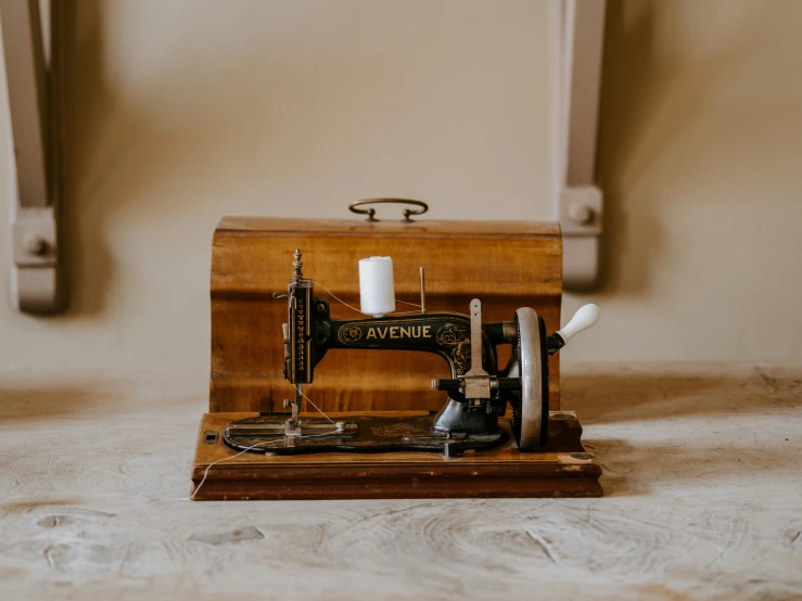 an antique sewing machine is on display