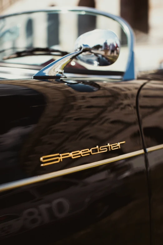 a close up s of a shiny black car