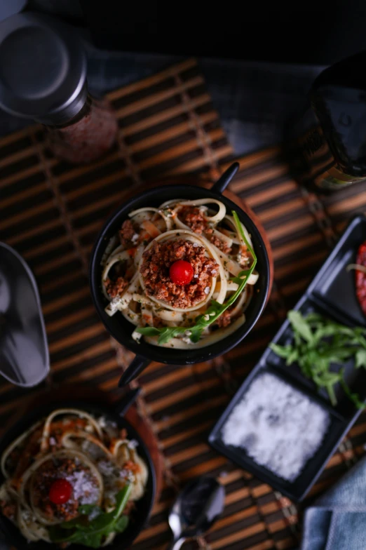 a table topped with plates filled with food