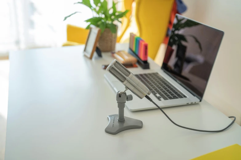 a usb lamp on top of a laptop computer