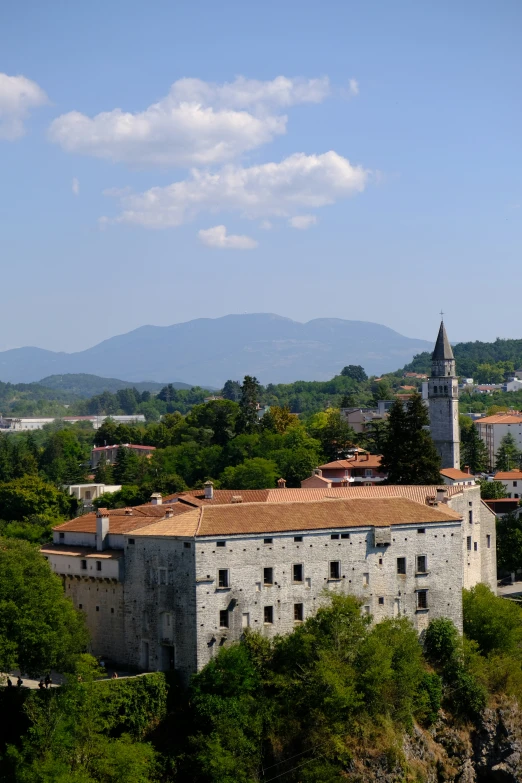 the castle is located on top of a mountain