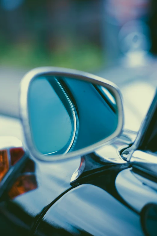 a side view mirror on the top of a car