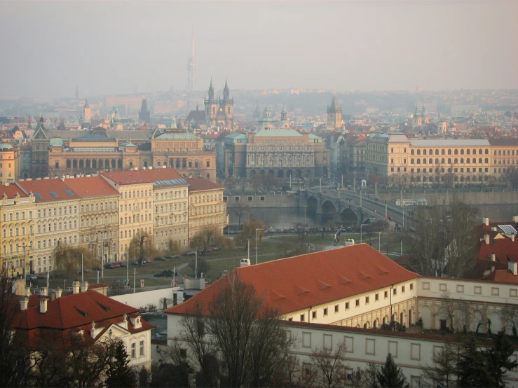 a city with some tall buildings next to a city