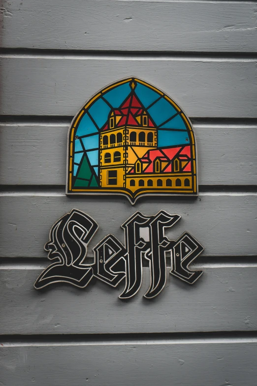 a painting depicting the name, seattle above a stained glass window