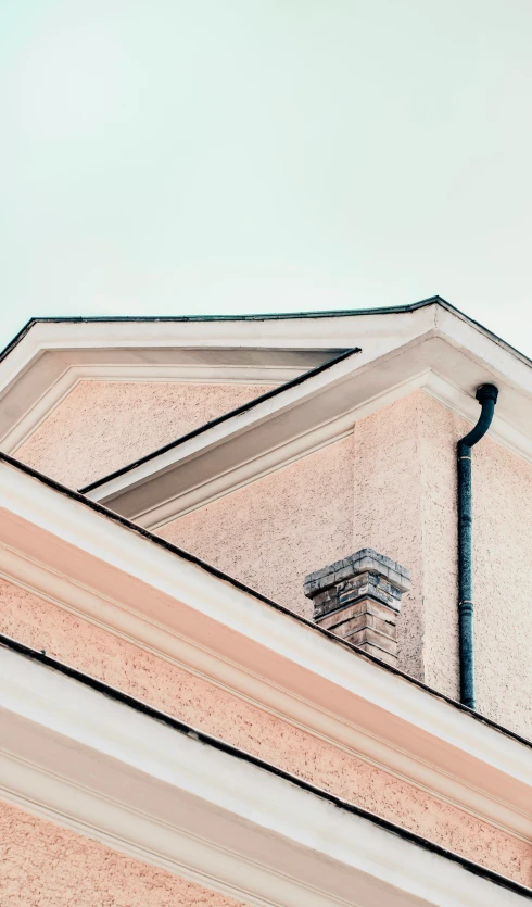 a roof with an air vent above it