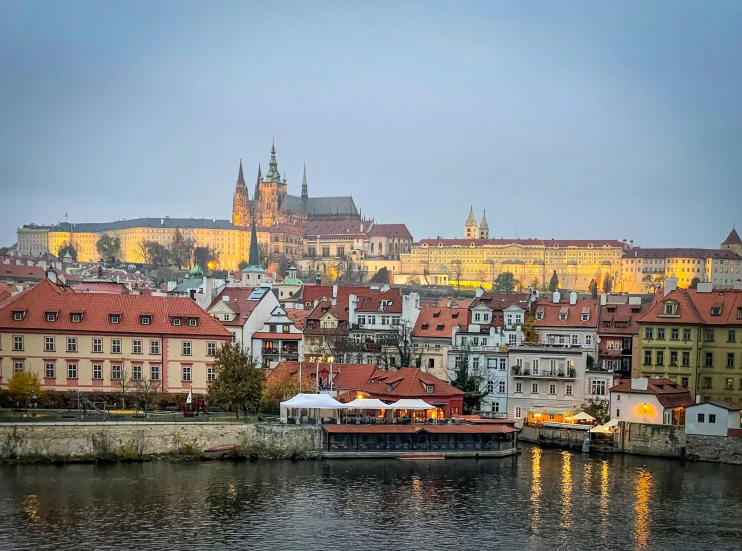 many buildings, and towers sit near water