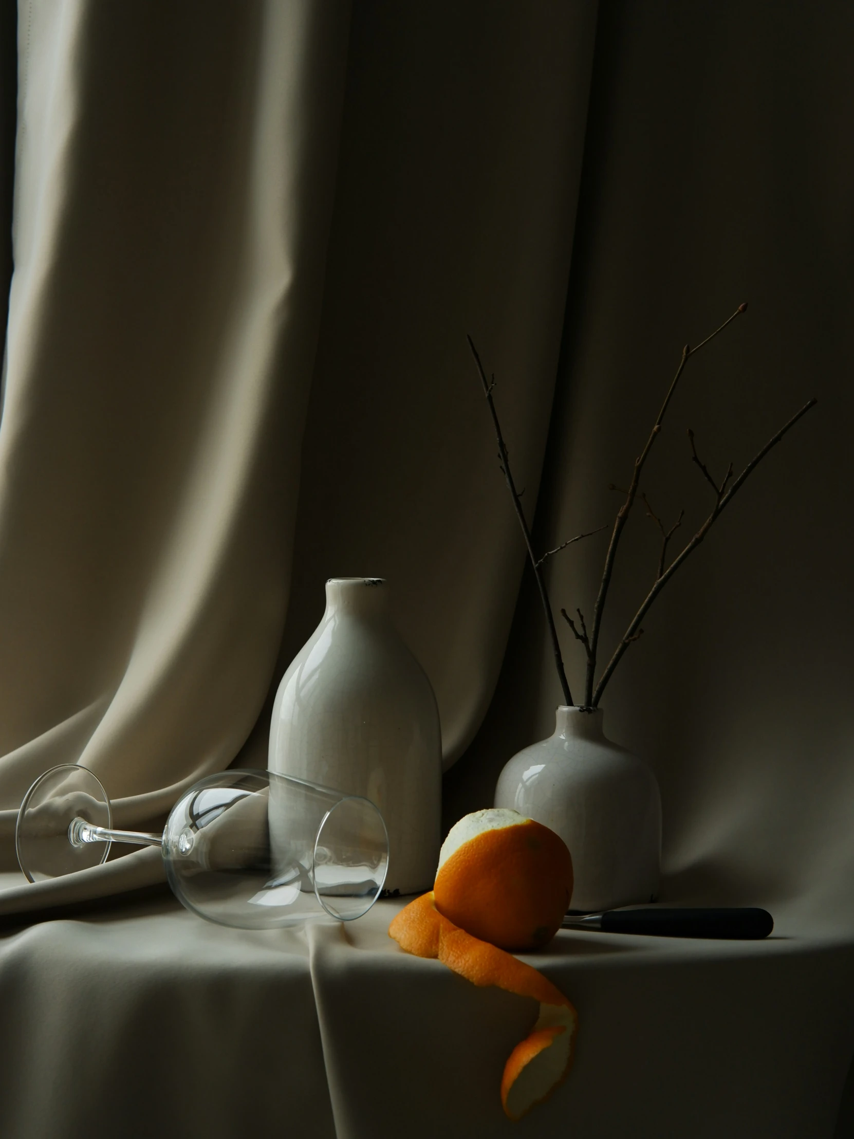 a vase with dried orange slices on top