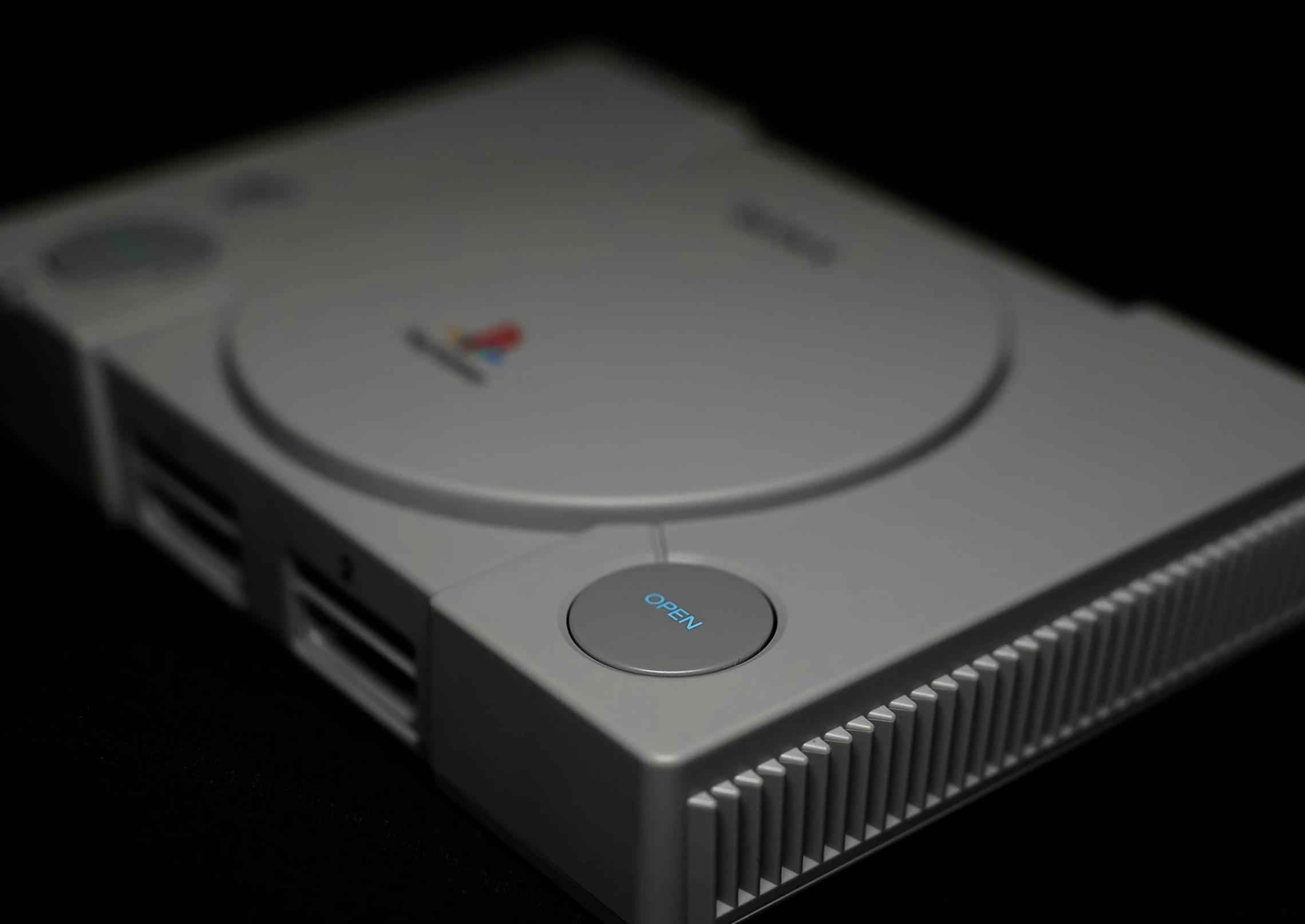 the closeup of the playstation classic console is blurry