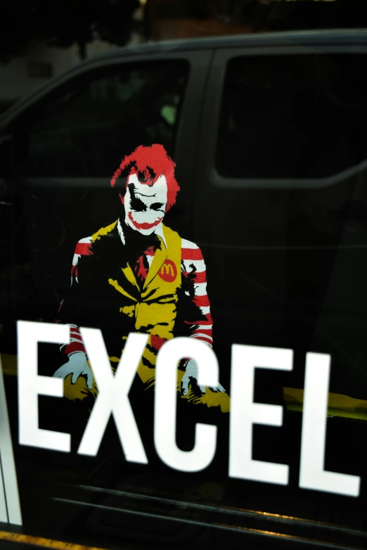 a joker sticker on the side of a truck