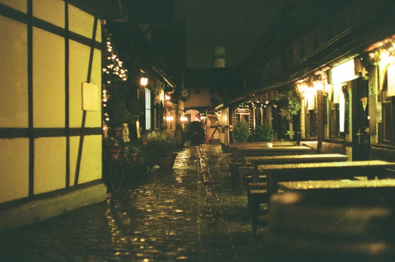 a rain soaked city street at night