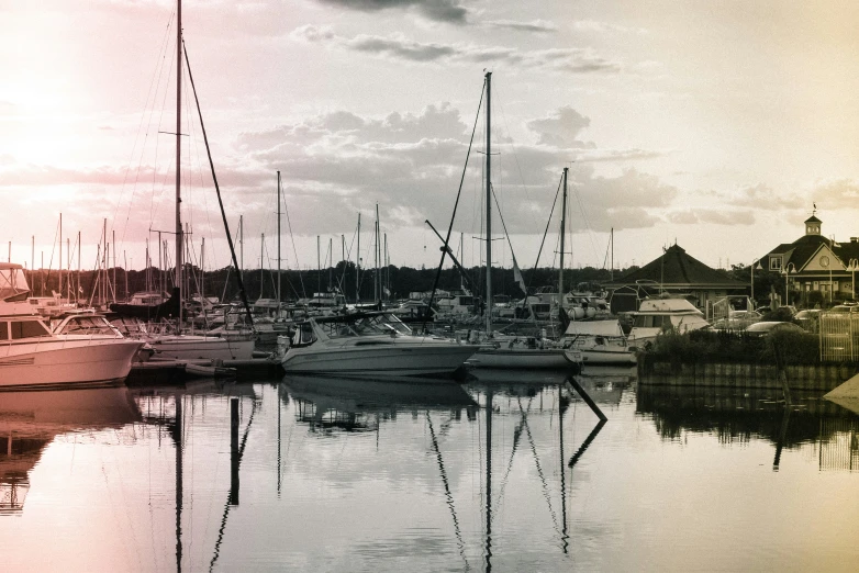 black and white pograph of a sailboat marina