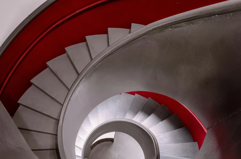 the top view of a spiral staircase made of concrete