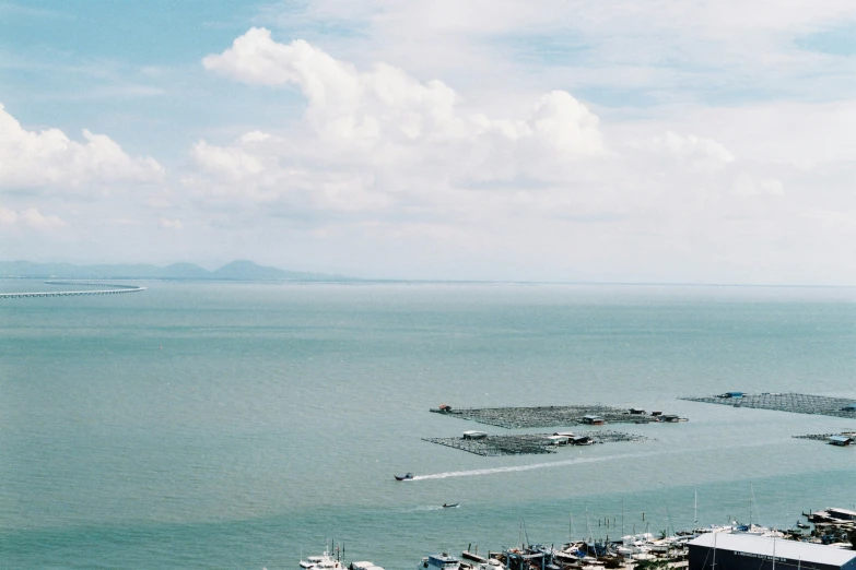 a large body of water sitting next to a boat dock