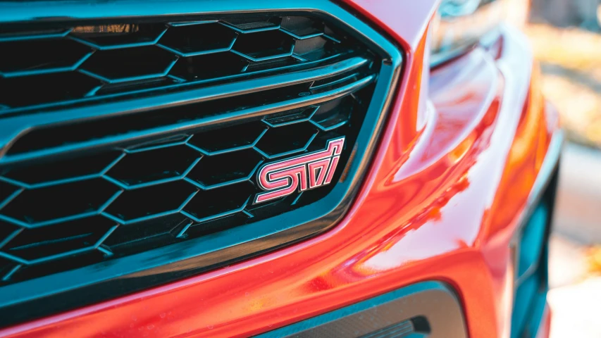 the grille and grill on an orange car