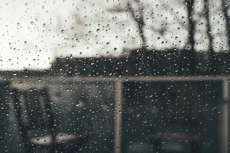 a rainy window with drops of water on it