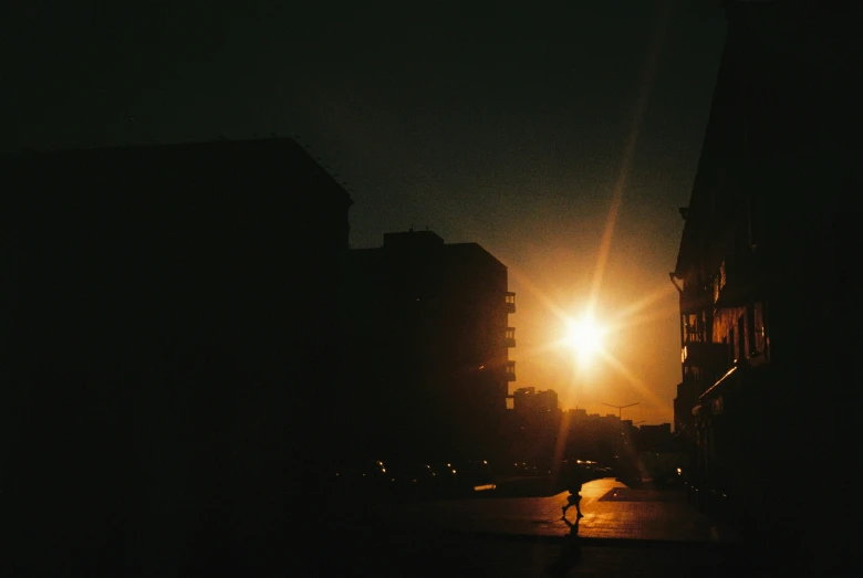 the backlit street lights at night in a city