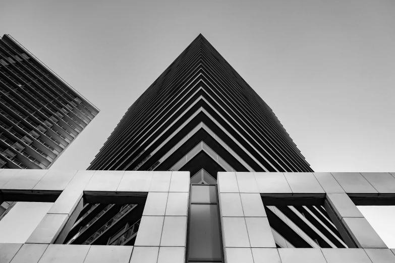 a building with many windows and an upward view