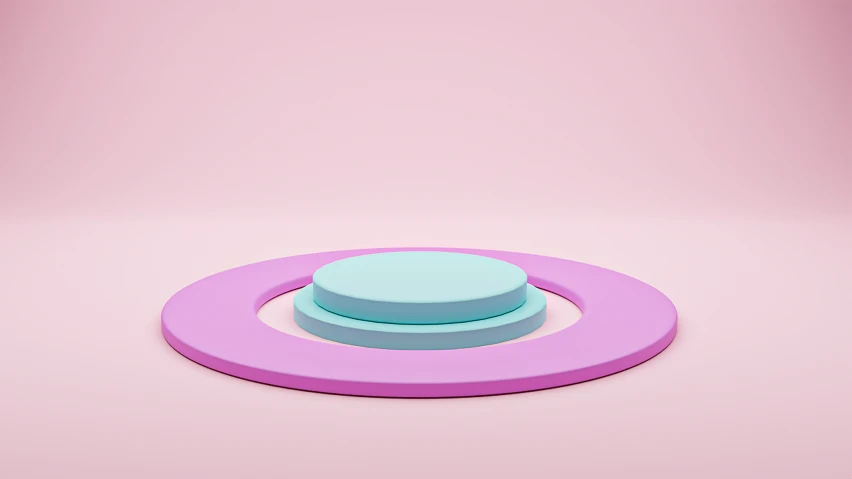 a pink and blue object is sitting in the middle of a room