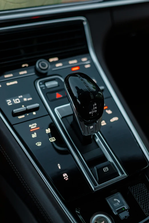 a electronic device on top of a car stereo